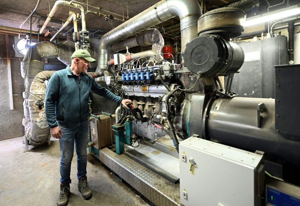 Farmer Gerhard Geywitz has a fermentation plant at his farmstead in Bermaringen, southwestern Germany