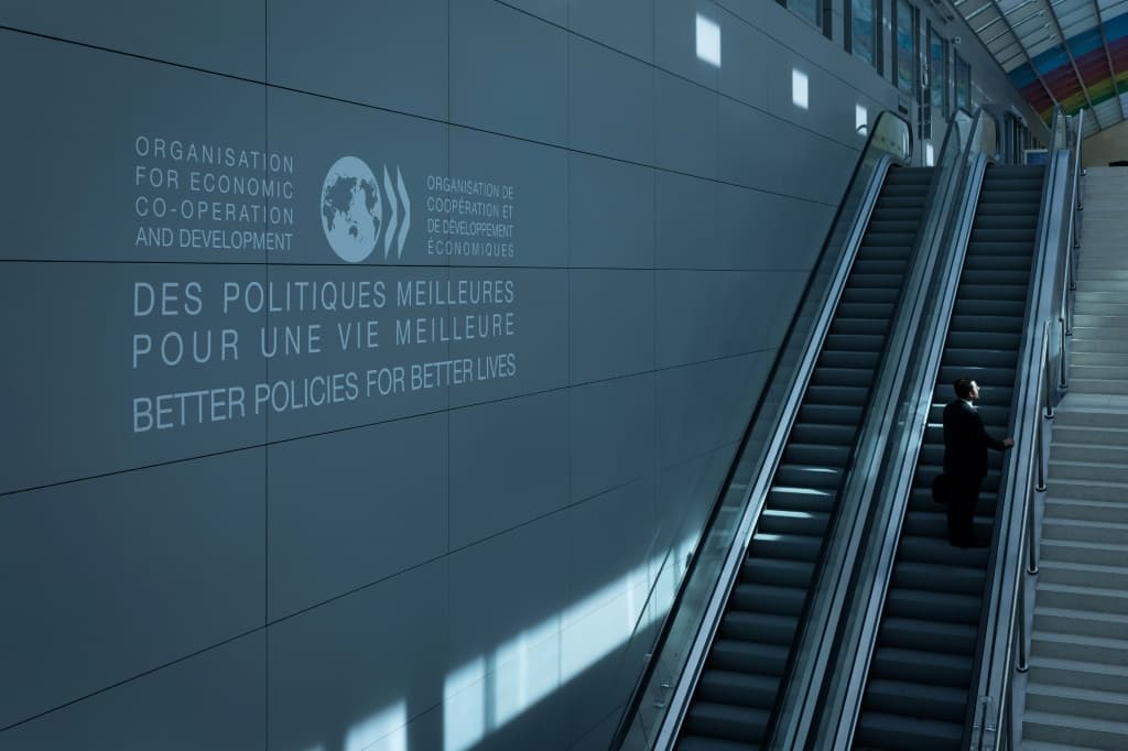 OECD เพิ่มคาดการณ์เศรษฐกิจโลก 2025 เป็น 3.2% หลังรับมือภาษีนำเข้าทรัมป์ได้