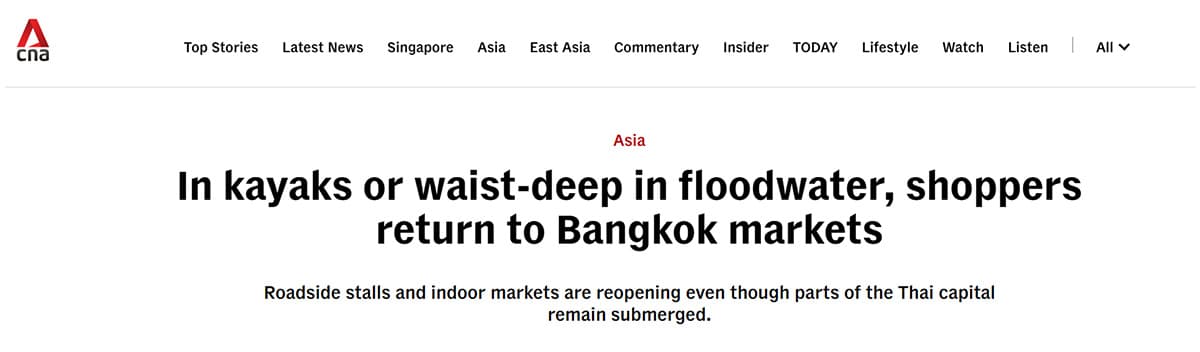 in-kayaks-or-waist-deep-in-floodwater-shoppers-return-to-bangkok-markets-SPACEBAR-Photo01.jpg