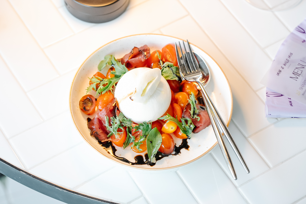 PhotoStory-Burrata salad with heirloom tomatoes, beef bresaola, balsamic reduction