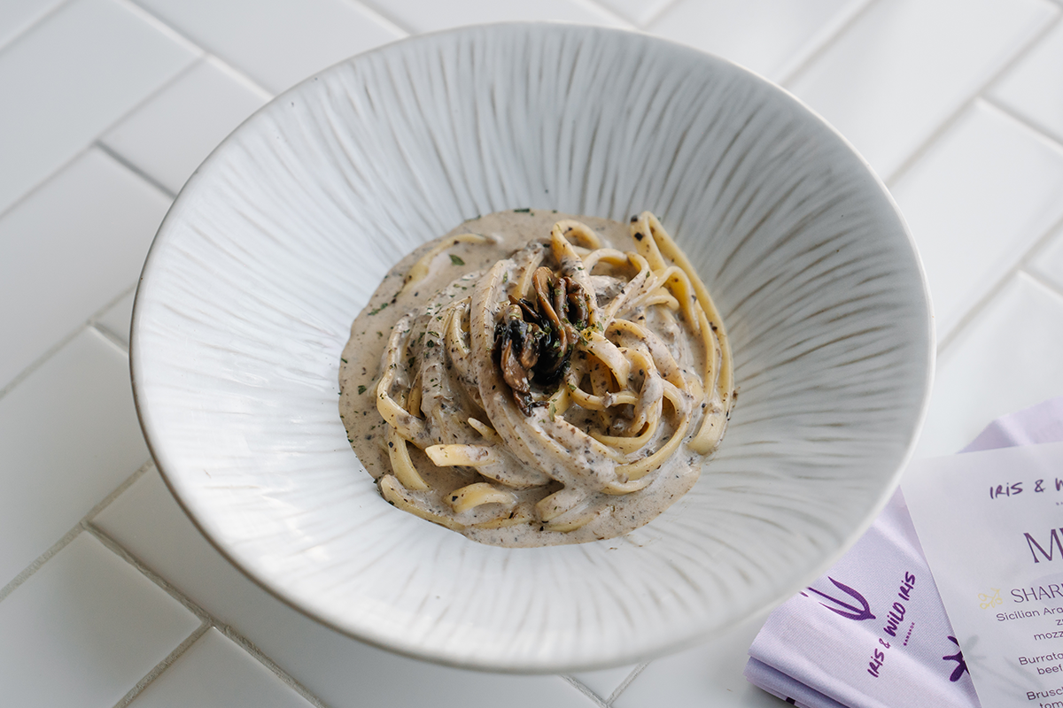 PhotoStory-Our freshly made fettuccine with truffle sauce, mixed mushrooms and cream